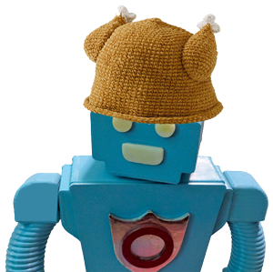 A picture of a robot in a turkey hat